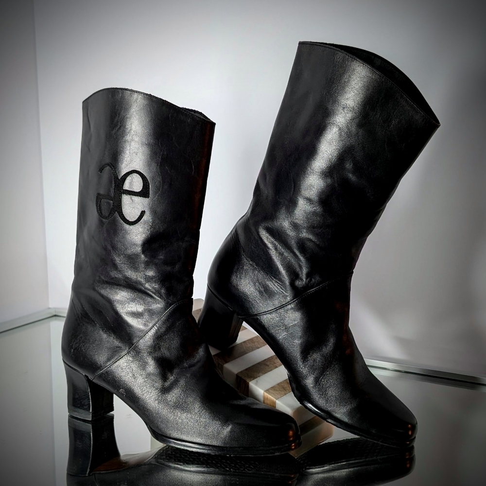 Sleek European Black Heeled Boots with Glossy Finish and Elegant Design